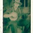 Greg Hooven with Straw hat and banjo